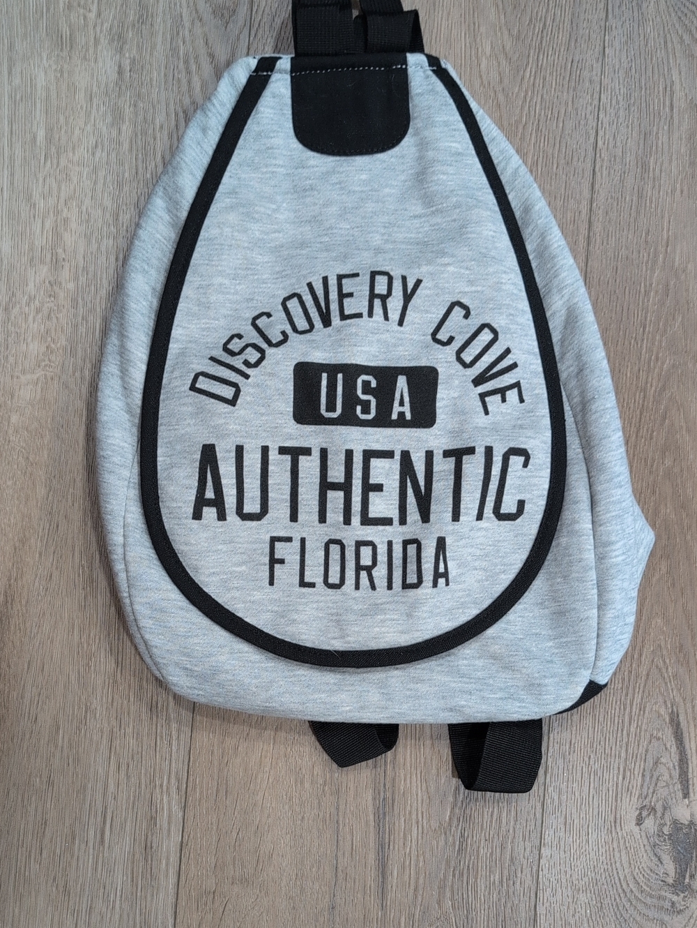 USA Authentic Grey Sling Backpack with Bold Text
